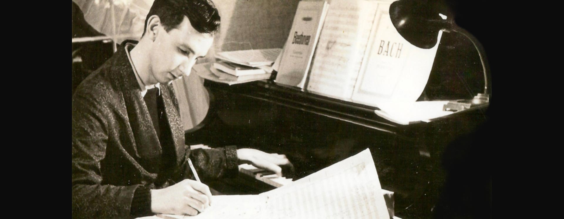 25-year-old Sauter at work on a score for the Benny Goodman big band.